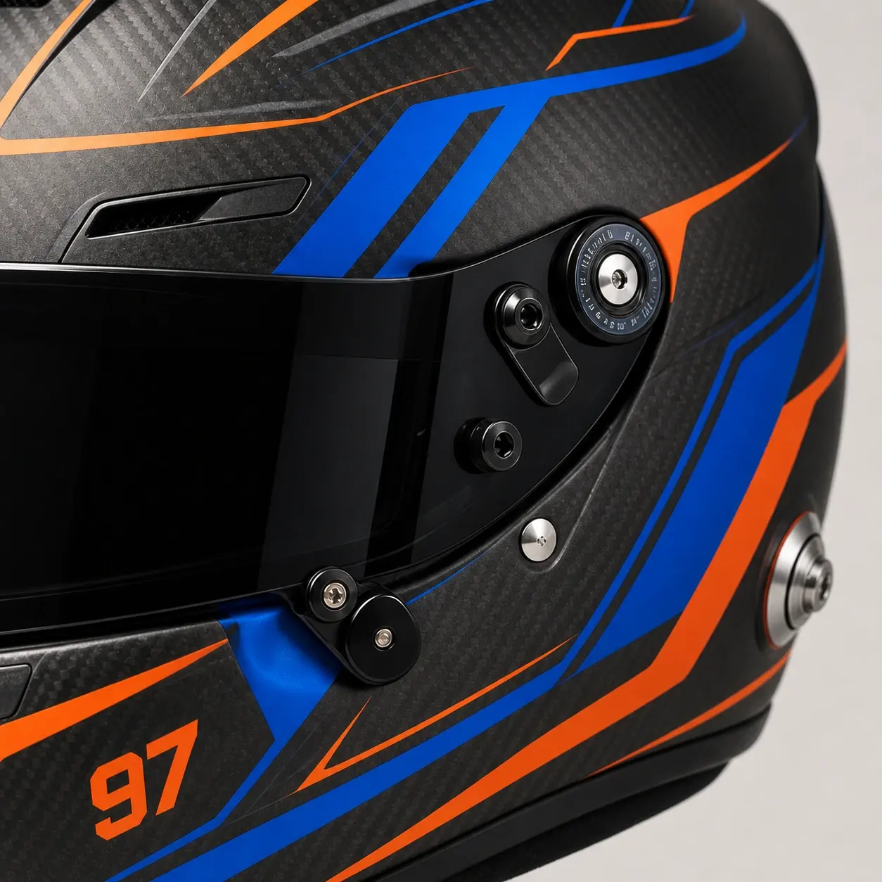 Detailed carbon-fibre racing helmet visor hardware